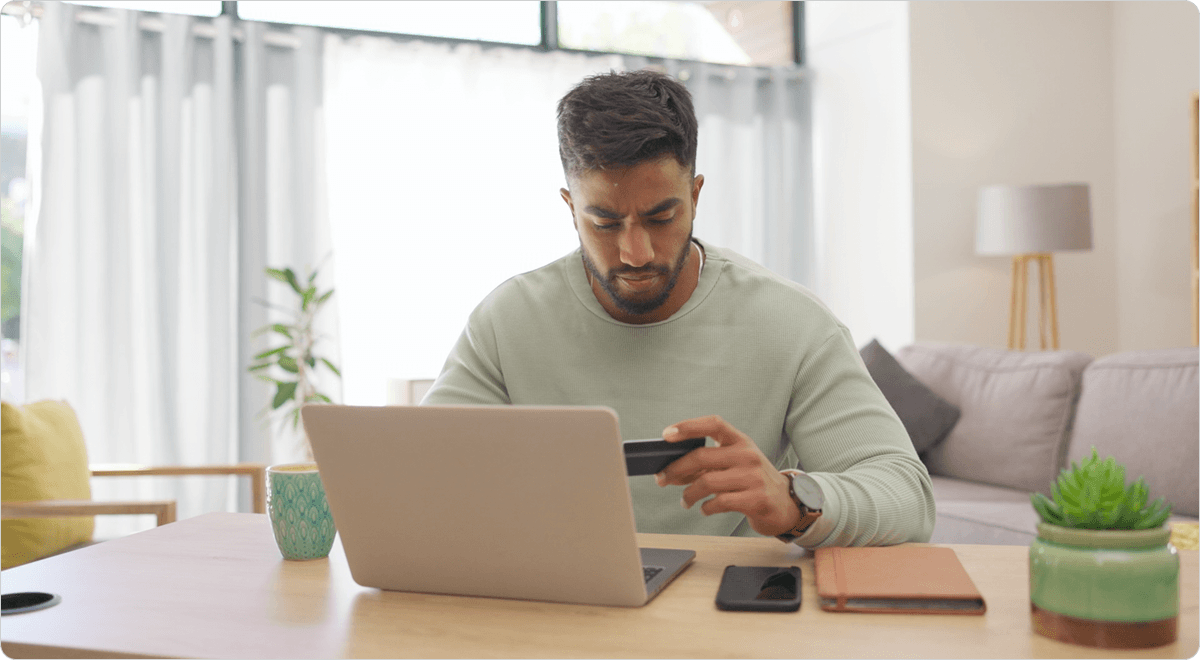 Investor managing their portfolio on a laptop